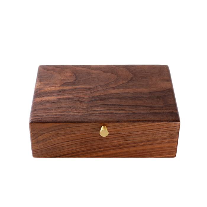 Wooden box with a gold lock on a white background