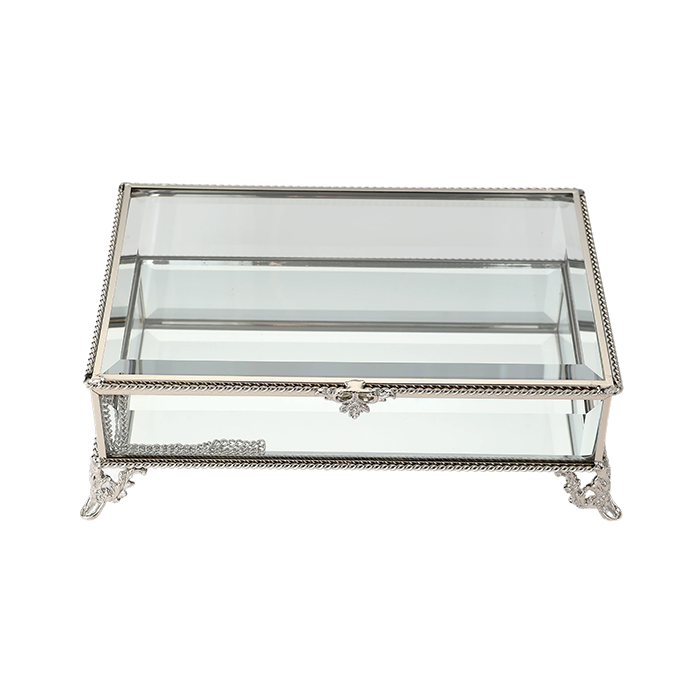 Decorative glass box with silver metal frame on a white background