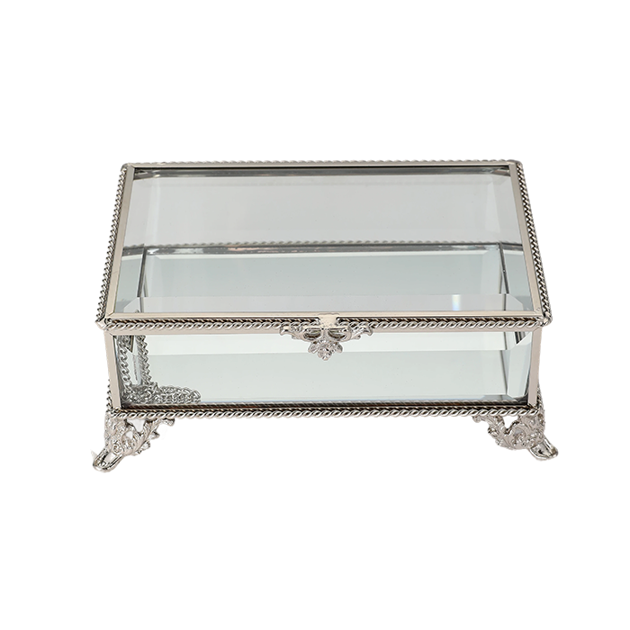 Decorative glass box with silver metal frame on a white background