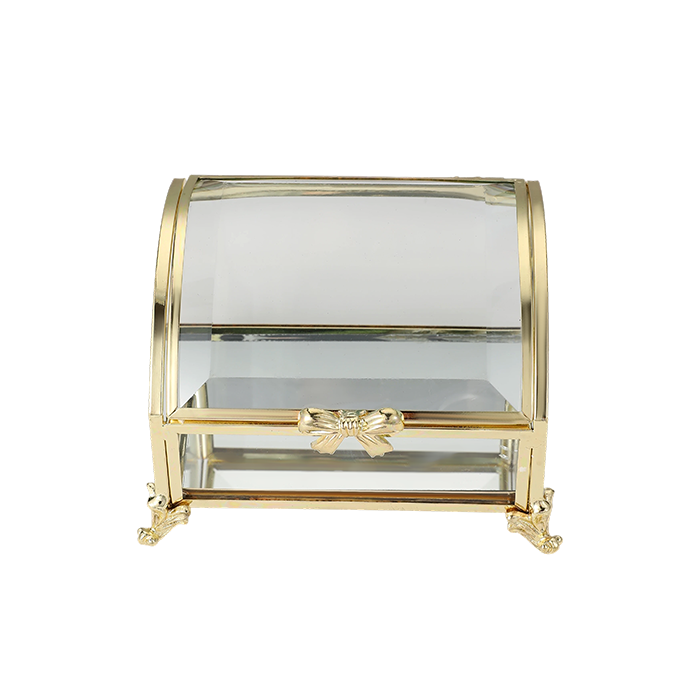 Glass display case with gold accents on a white background
