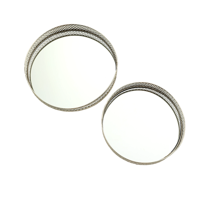 Two silver rings with textured band design on a white background