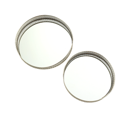 Two silver rings with textured band design on a white background