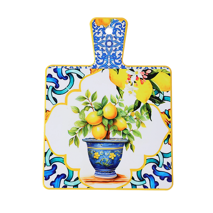Decorative cutting board with floral and fruit design on a white background