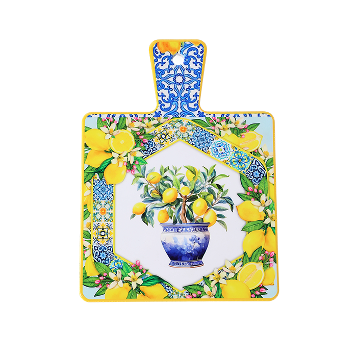 Decorative cutting board with lemon design and floral patterns on a white background