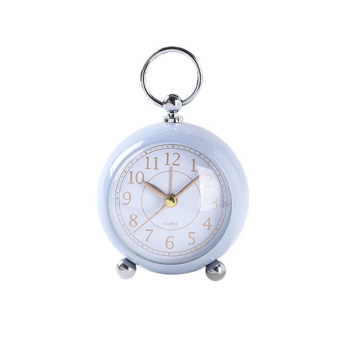 Small round clock with a keychain on a white background