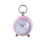 Pink pocket watch with a white face on a white background